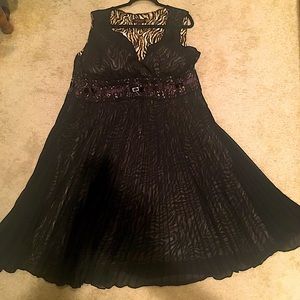 Black dress with zebra print underneath